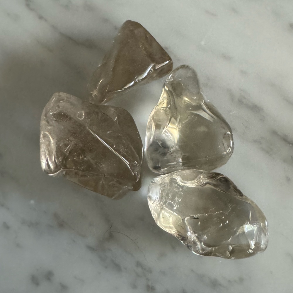 Tumbled clear quartz and pink quartz